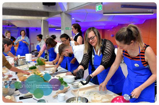 The Unite! community during a cooking class at Wroclaw Tech