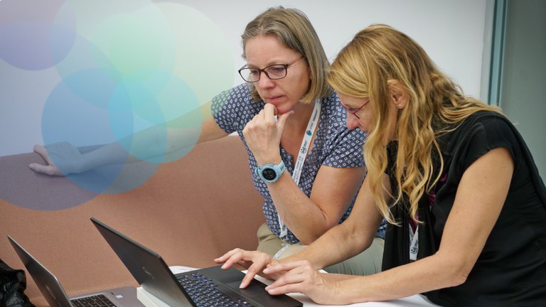 Two members of the Unite! community working together during the VI Unite! Dialogue in Torino.