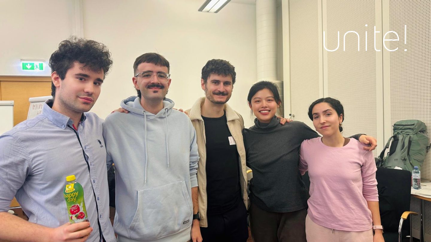 Group of young students smiling at the camera