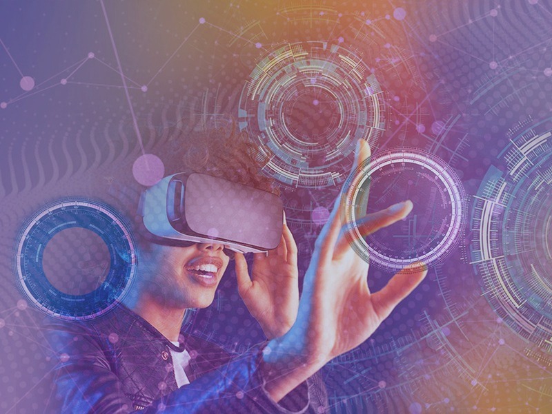 See larger image A woman with virtual reality glasses in an artificial envirionment with technological elements.