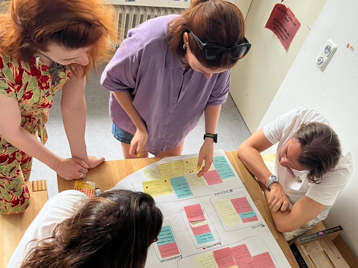 See larger image People working together in a brainstorming session