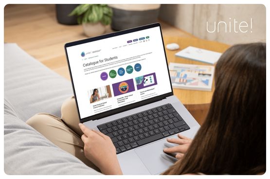 See larger image Girl consulting the Catalogue in her laptop